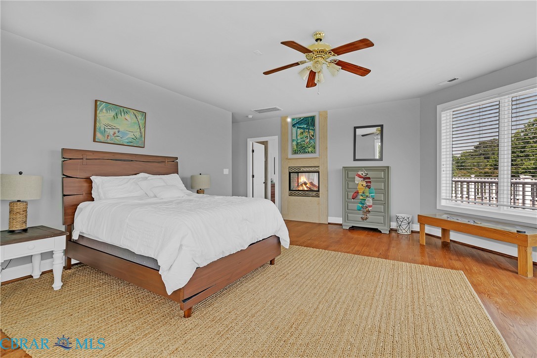2106 Clarketown Road Heathsville, VA 22473 - Photo 32 of 56 a bedroom with a bed and a large window