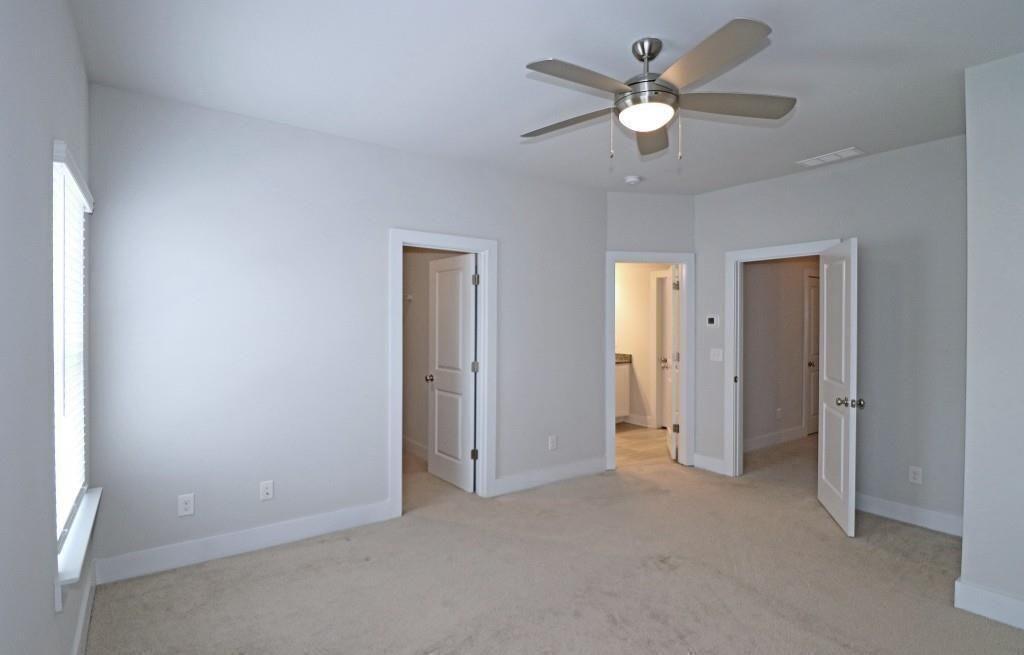 2163 Wiggins Walk Atlanta, GA 30316 - Photo 9 of 22 a view of an empty room with a ceiling fan