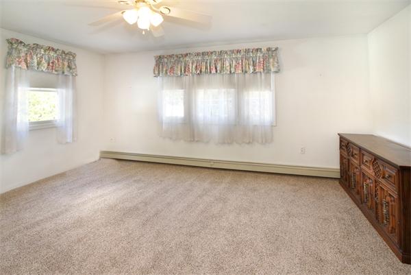 14 Samoset Road Woburn, MA 01801 - Photo 14 of 25 an empty room with a empty space and windows