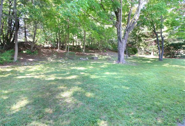 14 Samoset Road Woburn, MA 01801 - Photo 24 of 25 a view of a trees in a yard