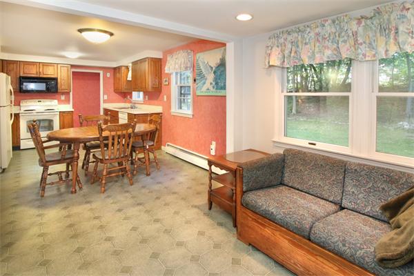 14 Samoset Road Woburn, MA 01801 - Photo 6 of 25 a living room with furniture and a large window