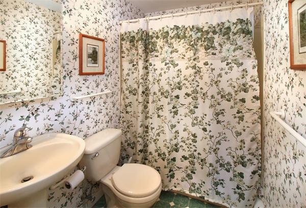14 Samoset Road Woburn, MA 01801 - Photo 9 of 25 a bathroom with a toilet and a sink