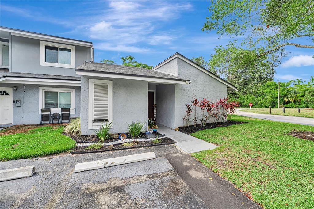 701 St Michael Lane Altamonte Springs, FL 32714 - Photo 1 of 19 a front view of house with yard