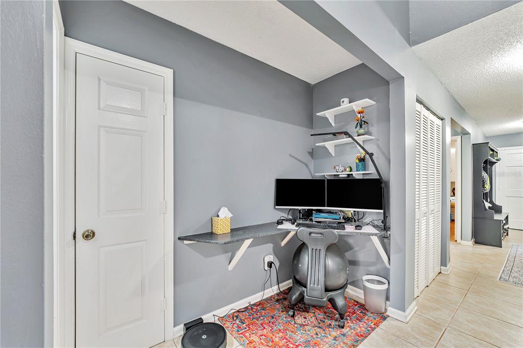 701 St Michael Lane Altamonte Springs, FL 32714 - Photo 12 of 19 a living room with furniture and a flat screen tv