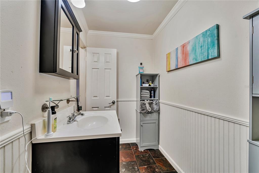 701 St Michael Lane Altamonte Springs, FL 32714 - Photo 13 of 19 a bathroom with a sink and a mirror