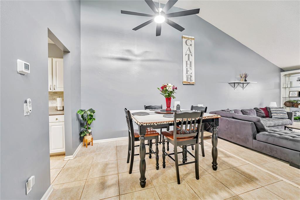 701 St Michael Lane Altamonte Springs, FL 32714 - Photo 4 of 19 a view of a dining room with furniture and wooden floor