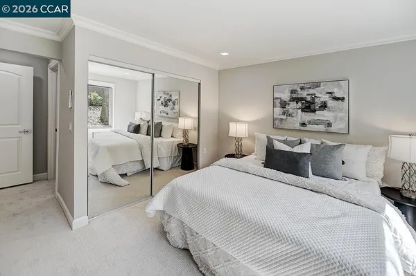 a bed room with a bed and furniture