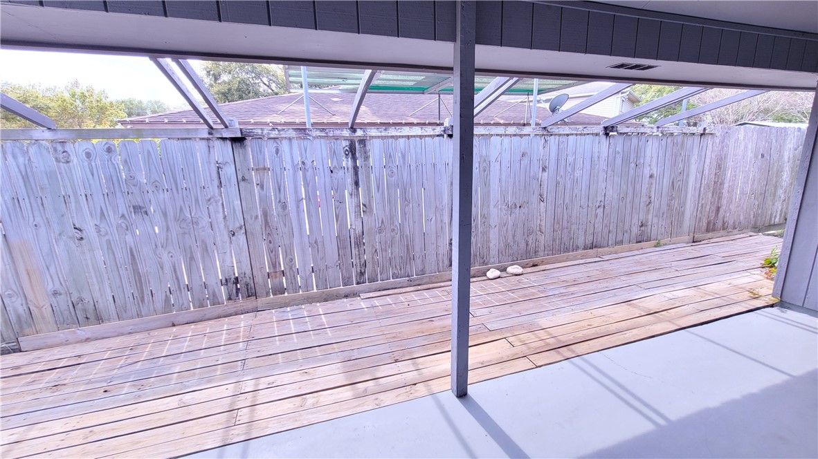 6925 Fawn Ridge Drive Corpus Christi, TX 78413 - Photo 15 of 16 a view of wooden door