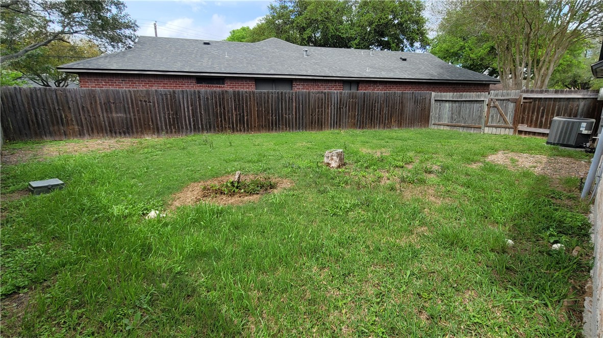 6925 Fawn Ridge Drive Corpus Christi, TX 78413 - Photo 16 of 16 a view of backyard with tub and trees