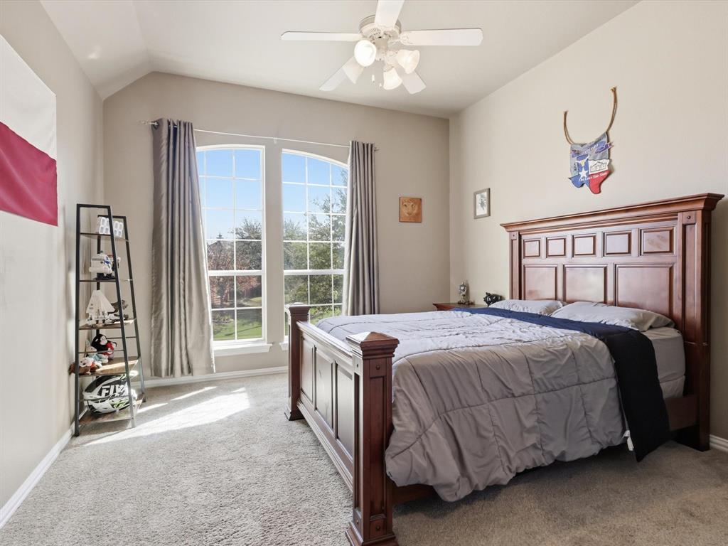 1130 Rio Bravo Way Shady Shores, TX 76208 - Photo 24 of 40 a bedroom with a bed and a window