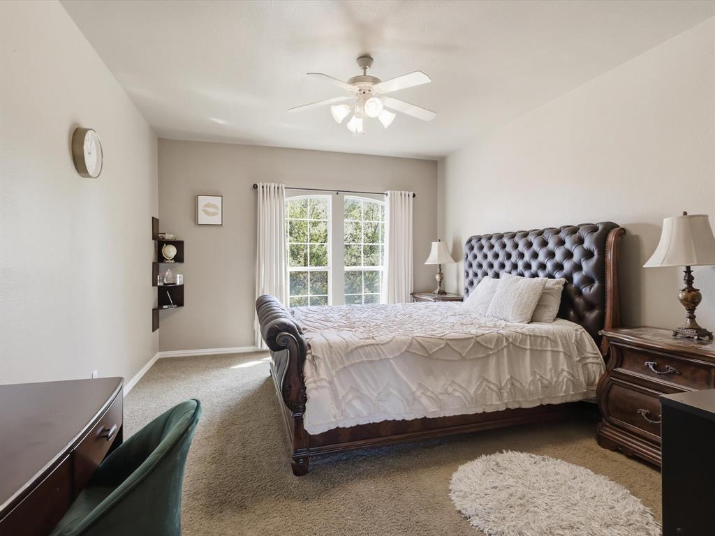 1130 Rio Bravo Way Shady Shores, TX 76208 - Photo 25 of 40 a bedroom with a bed a table and chair