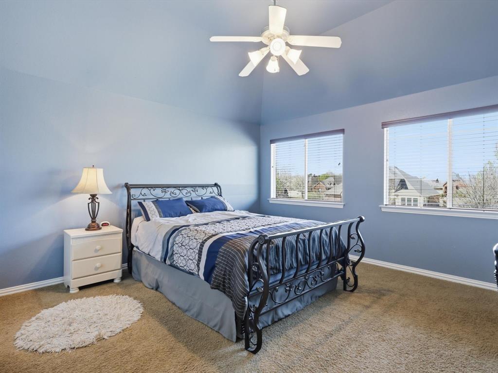 1130 Rio Bravo Way Shady Shores, TX 76208 - Photo 26 of 40 a bed sitting in a bedroom next to a window