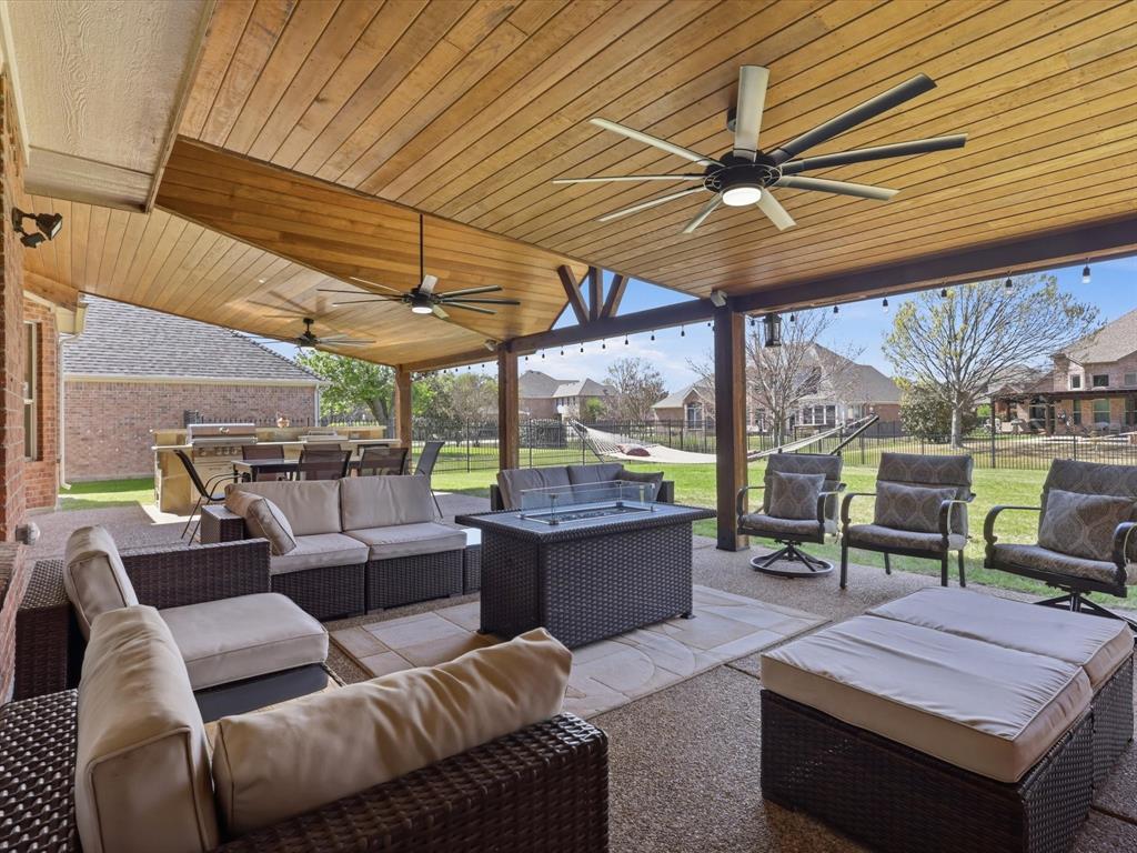 1130 Rio Bravo Way Shady Shores, TX 76208 - Photo 34 of 40 a outdoor space with patio the couches and a dining table with the garden view