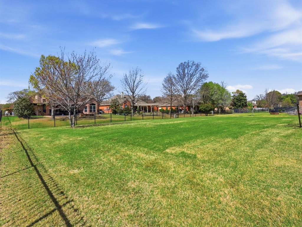 1130 Rio Bravo Way Shady Shores, TX 76208 - Photo 35 of 40 a city view with tall trees