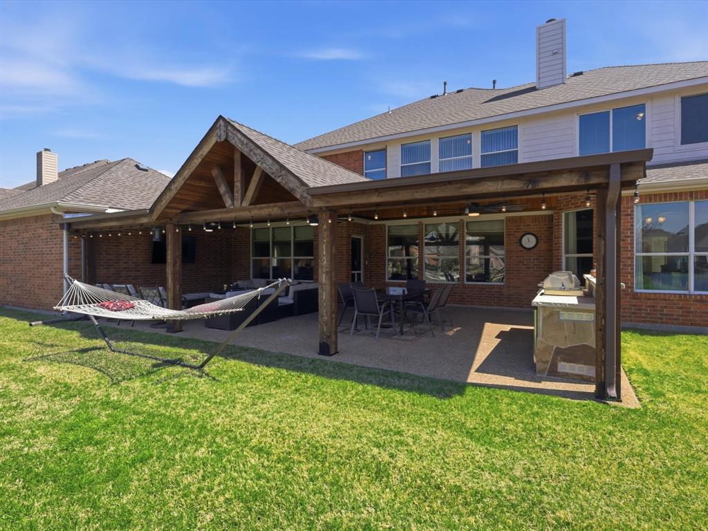 1130 Rio Bravo Way Shady Shores, TX 76208 - Photo 36 of 40 a front view of a house with swimming pool