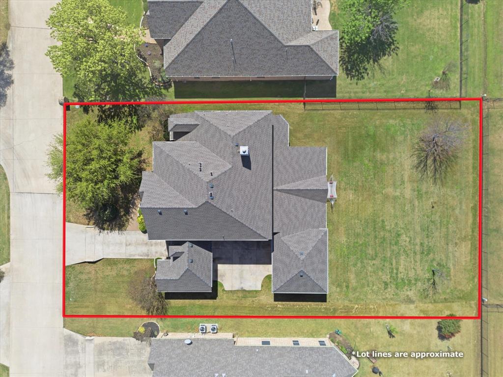 1130 Rio Bravo Way Shady Shores, TX 76208 - Photo 37 of 40 an aerial view of a house with a yard