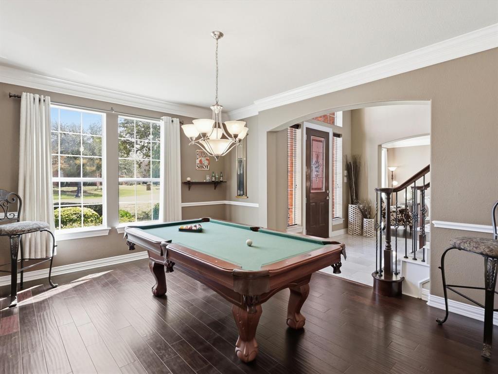 1130 Rio Bravo Way Shady Shores, TX 76208 - Photo 7 of 40 a room with pool table and windows