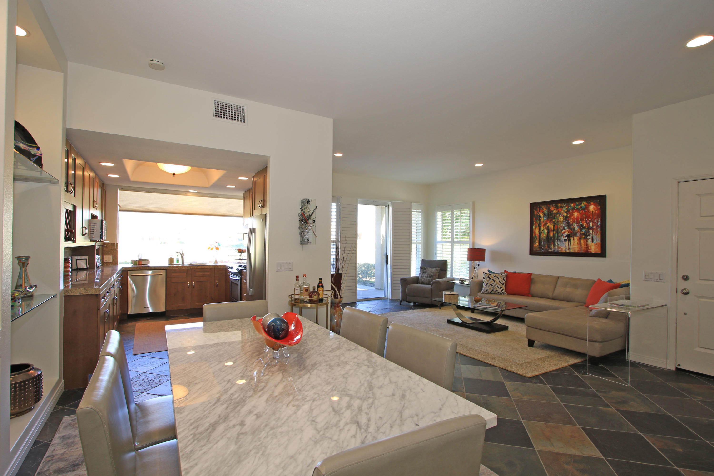 36 Pine Valley Drive Rancho Mirage, CA 92270 - Photo 17 of 57 a living room with furniture large window and wooden floor
