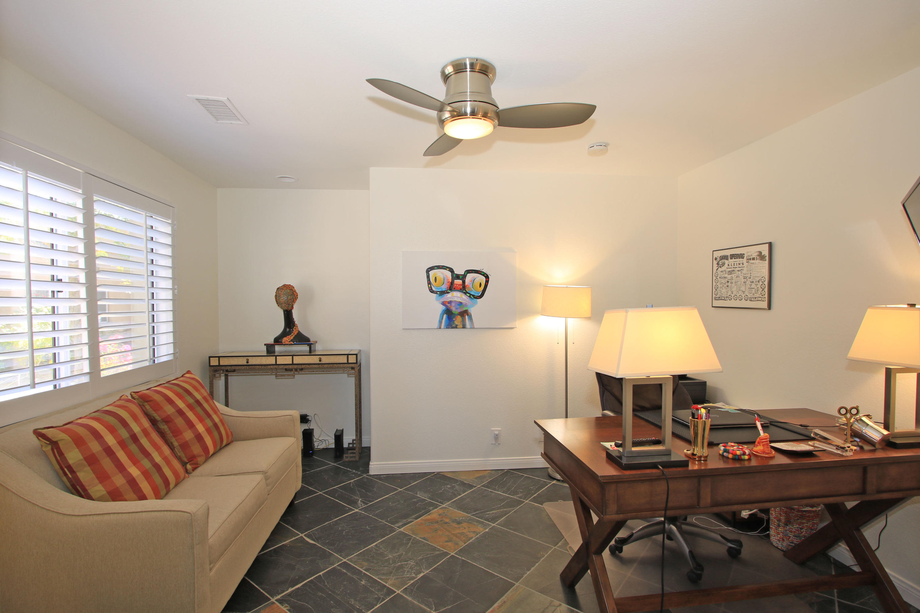 36 Pine Valley Drive Rancho Mirage, CA 92270 - Photo 20 of 57 a living room with furniture and a window