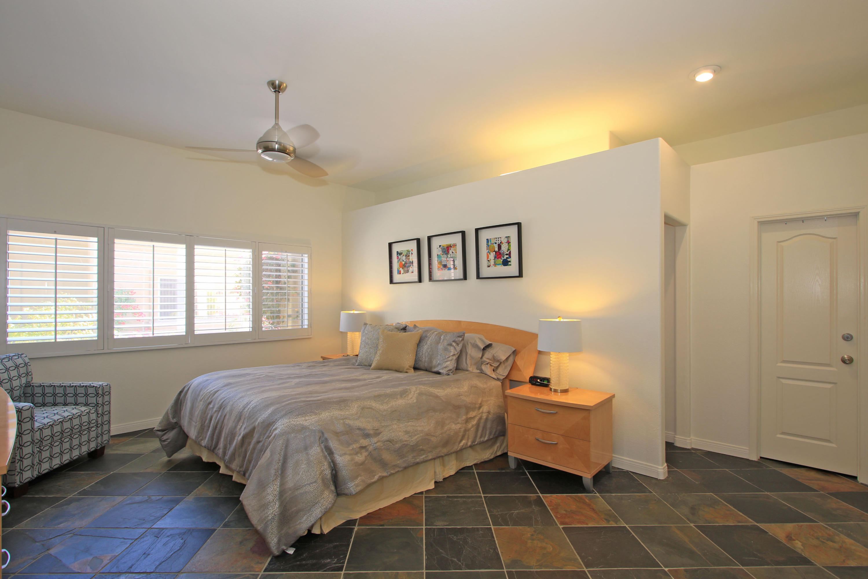 36 Pine Valley Drive Rancho Mirage, CA 92270 - Photo 21 of 57 a bedroom with a bed and a window