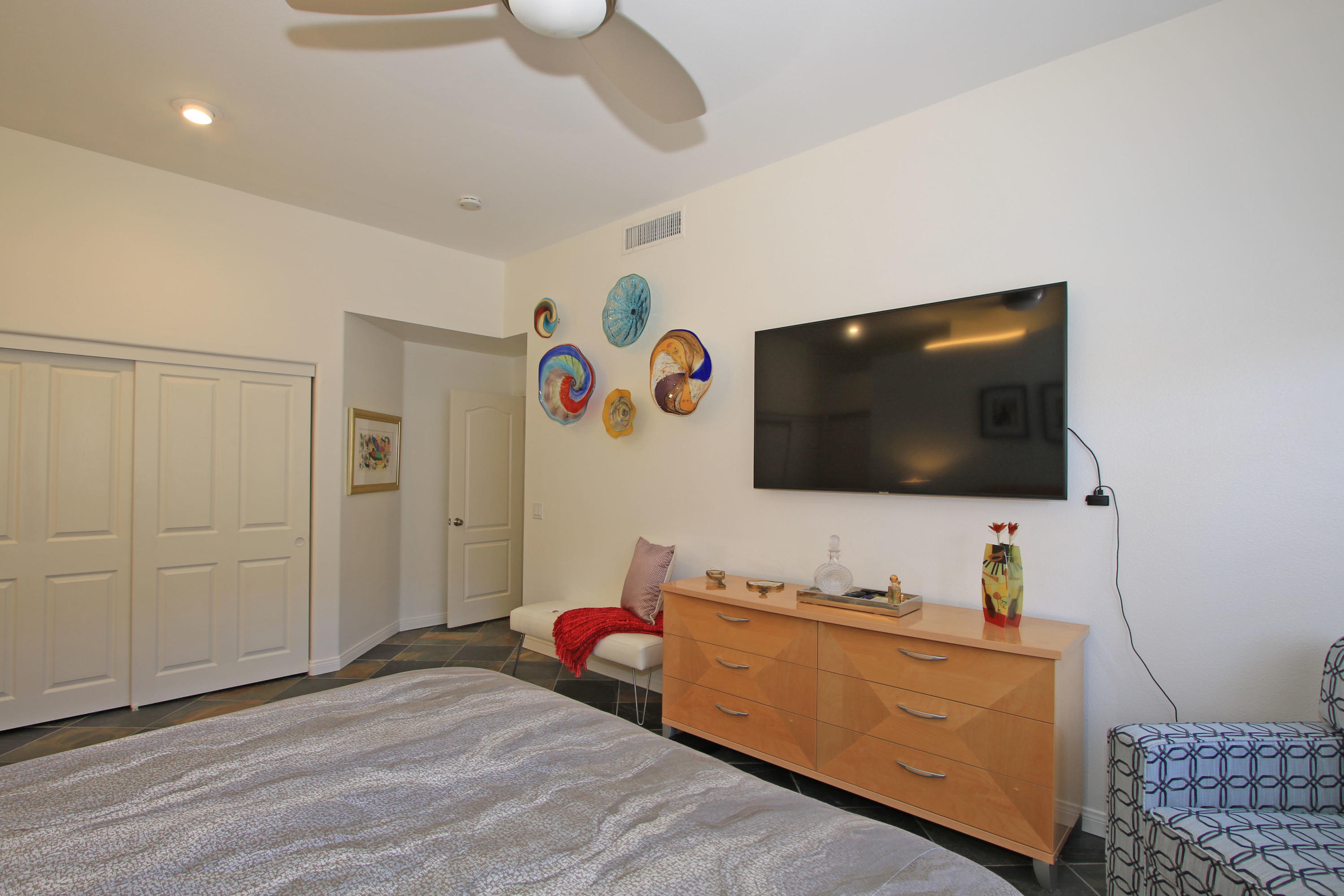 36 Pine Valley Drive Rancho Mirage, CA 92270 - Photo 22 of 57 a living room with furniture and a flat screen tv