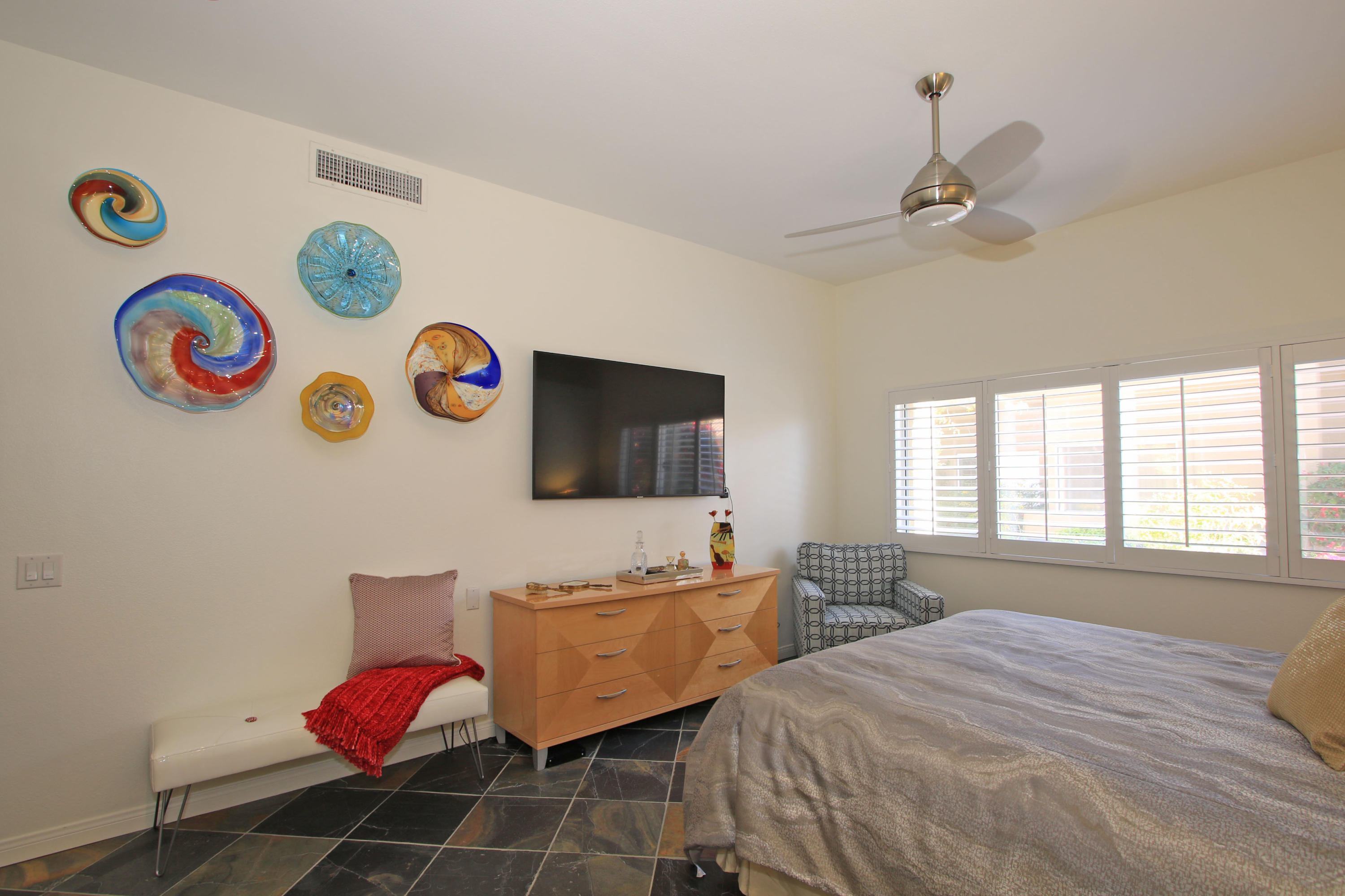 36 Pine Valley Drive Rancho Mirage, CA 92270 - Photo 23 of 57 a bedroom with a bed and a window