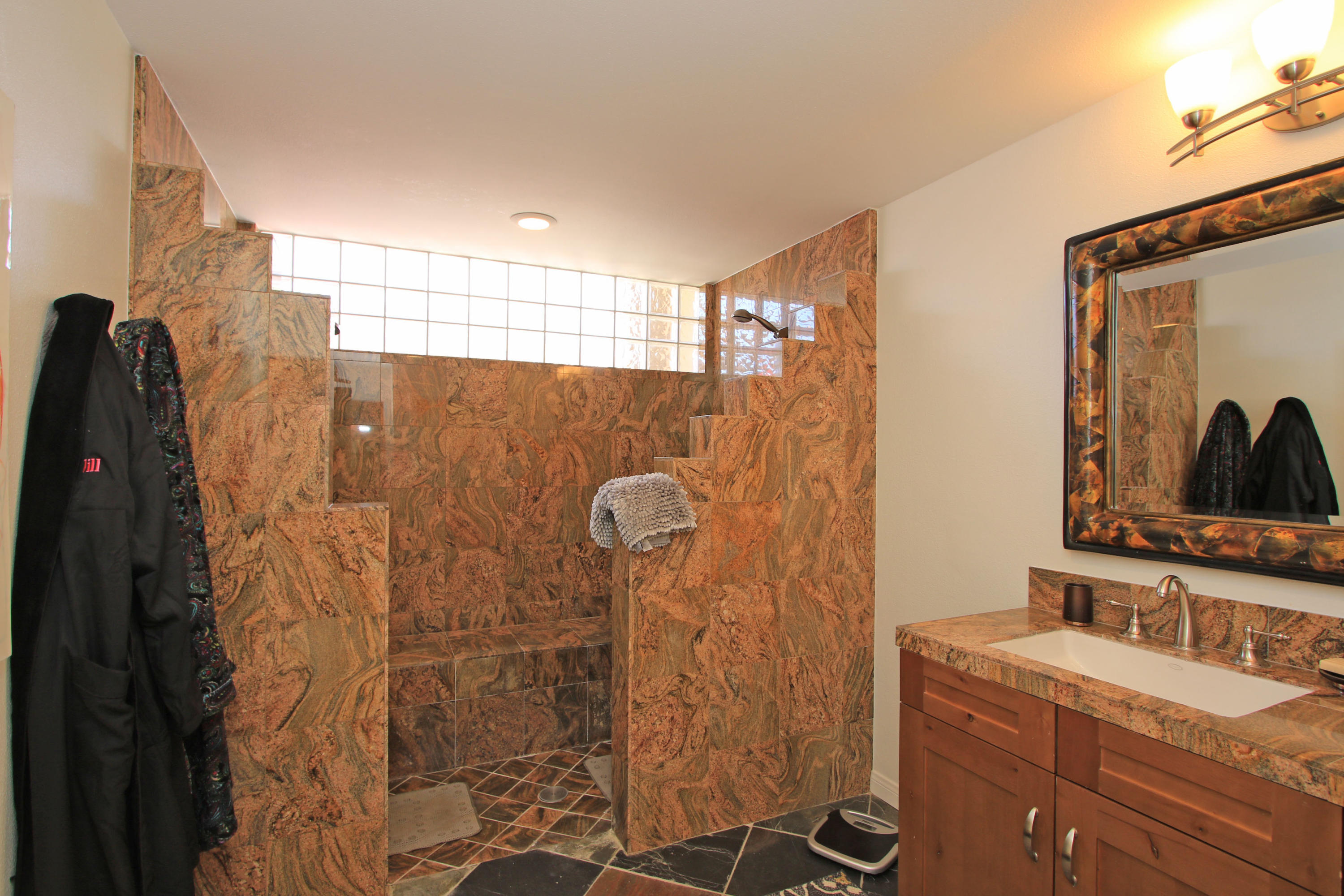 36 Pine Valley Drive Rancho Mirage, CA 92270 - Photo 24 of 57 a bathroom with a shower and a sink