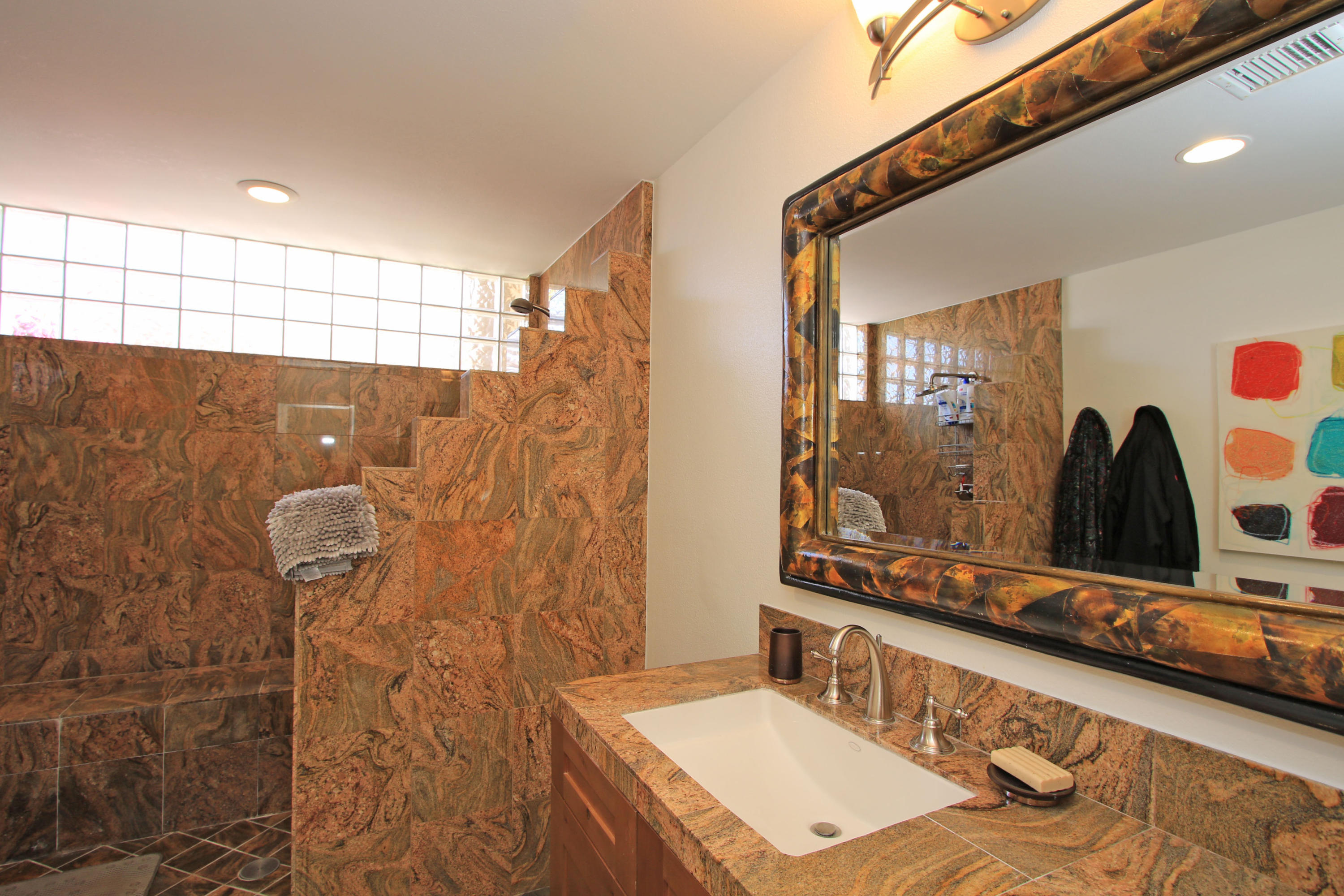 36 Pine Valley Drive Rancho Mirage, CA 92270 - Photo 25 of 57 a bathroom with a granite countertop sink a mirror and shower