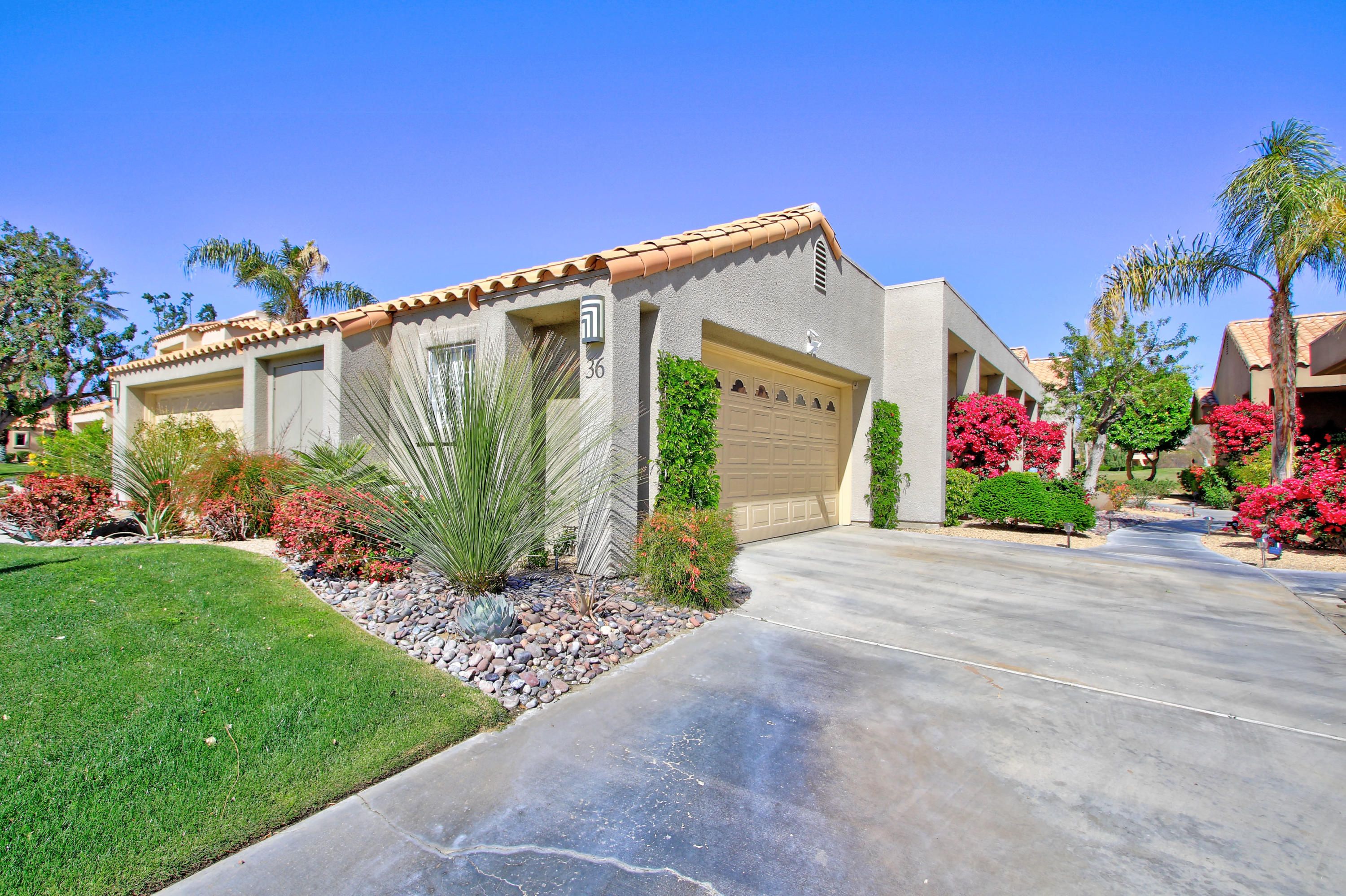36 Pine Valley Drive Rancho Mirage, CA 92270 - Photo 4 of 57 a view of a house with a backyard