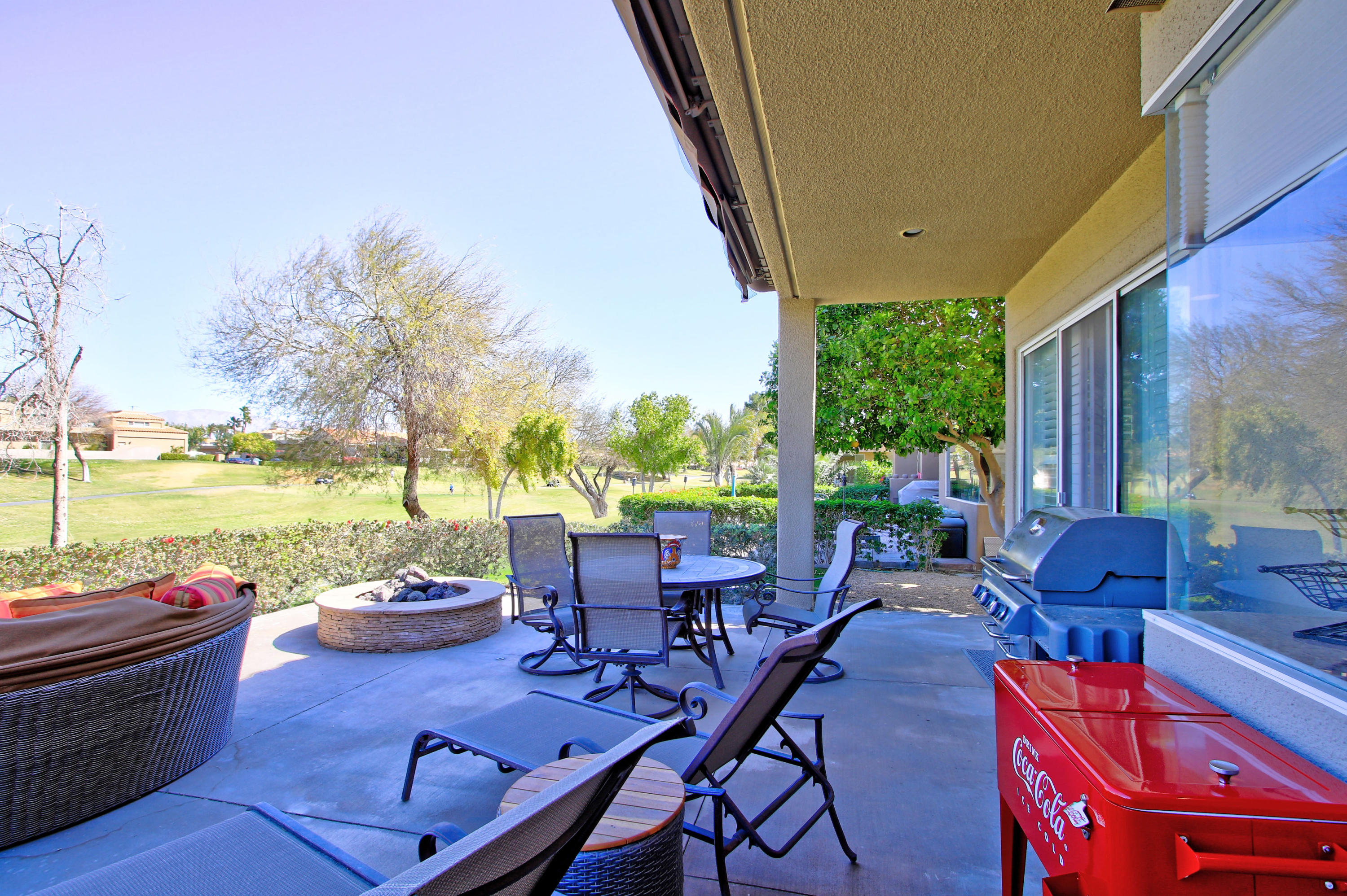 36 Pine Valley Drive Rancho Mirage, CA 92270 - Photo 33 of 57 a view of a patio with chairs and table in patio