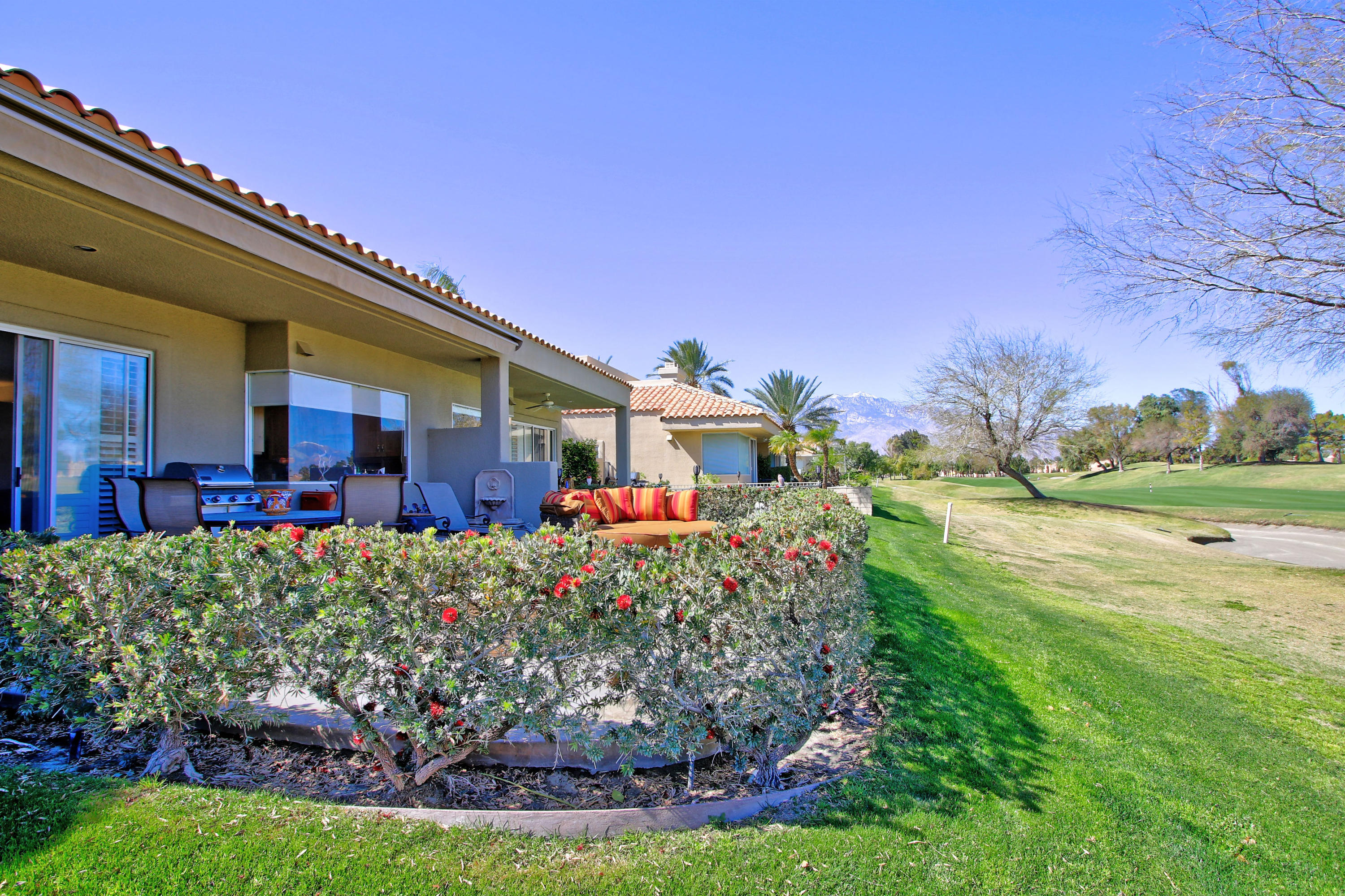 36 Pine Valley Drive Rancho Mirage, CA 92270 - Photo 35 of 57 a front view of a house with garden