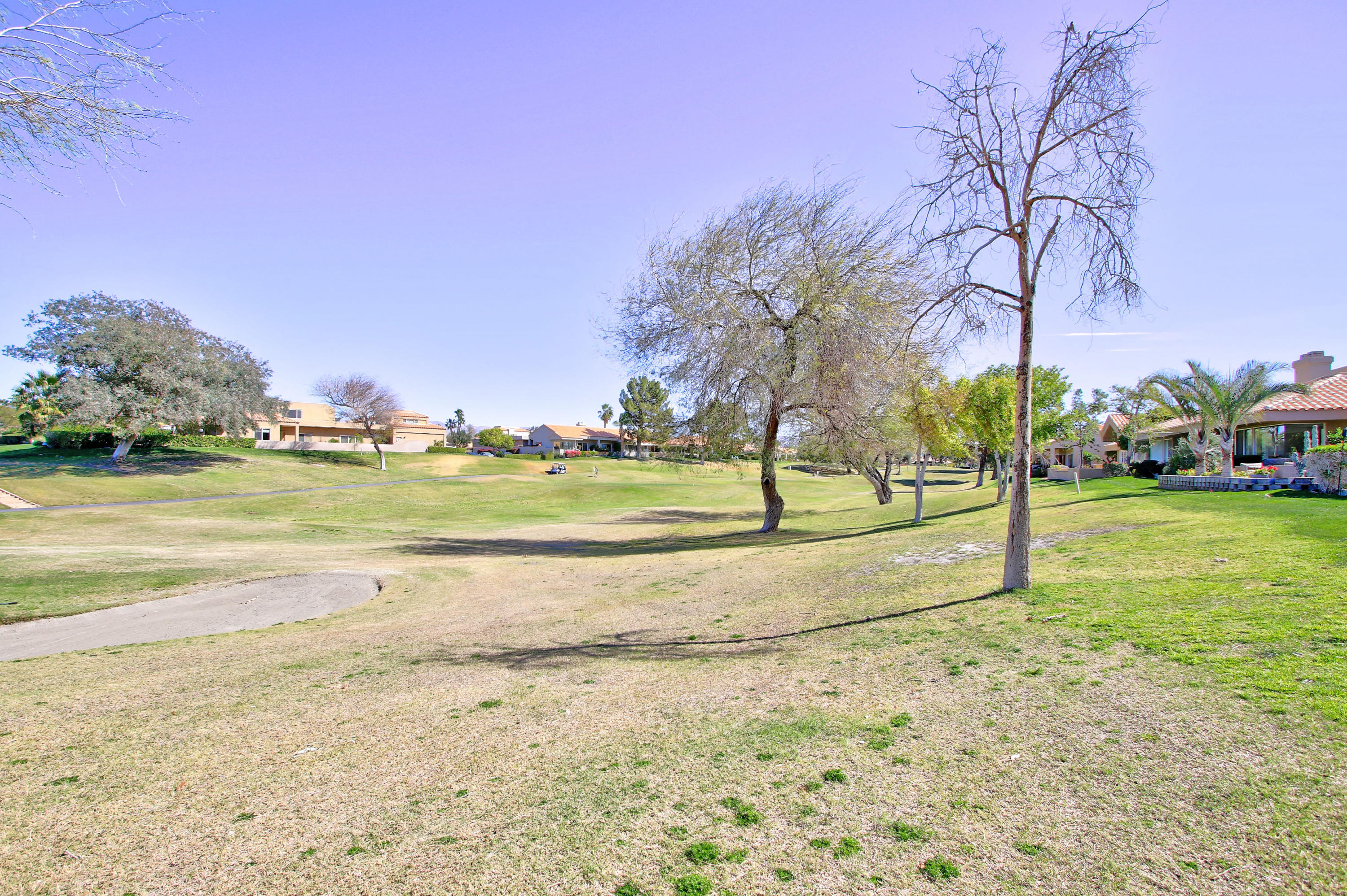 36 Pine Valley Drive Rancho Mirage, CA 92270 - Photo 43 of 57 a view of a playground with basketball court