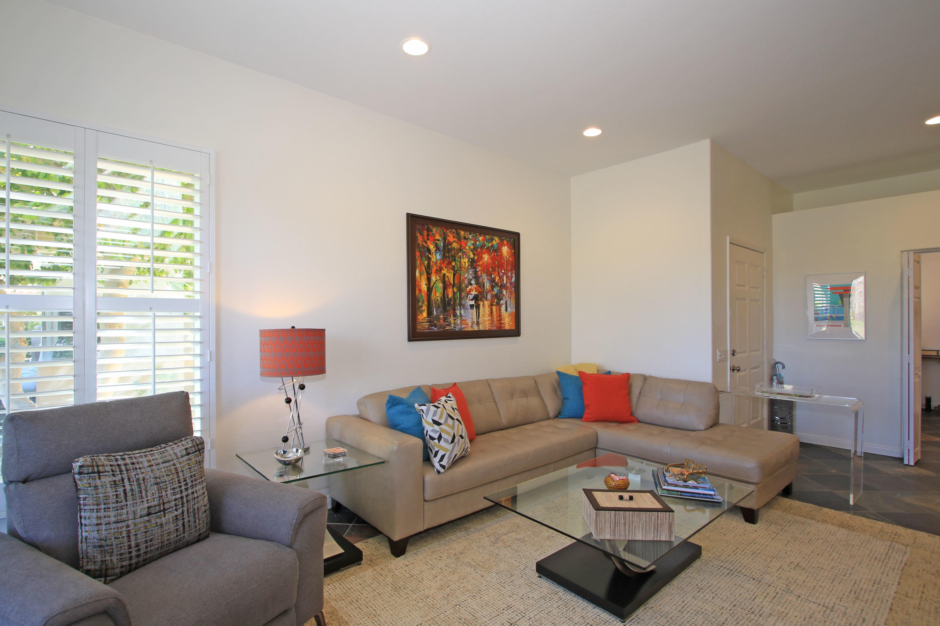 36 Pine Valley Drive Rancho Mirage, CA 92270 - Photo 9 of 57 a living room with furniture a rug and a window