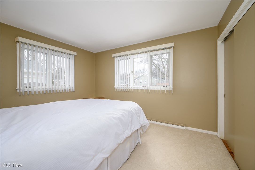 1989 Larchmont Road Akron, OH 44313 - Photo 24 of 38 Bedroom with light carpet