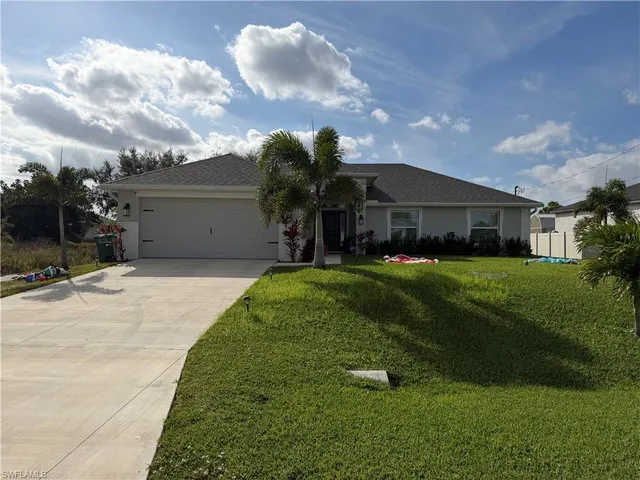 a house view with a garden space