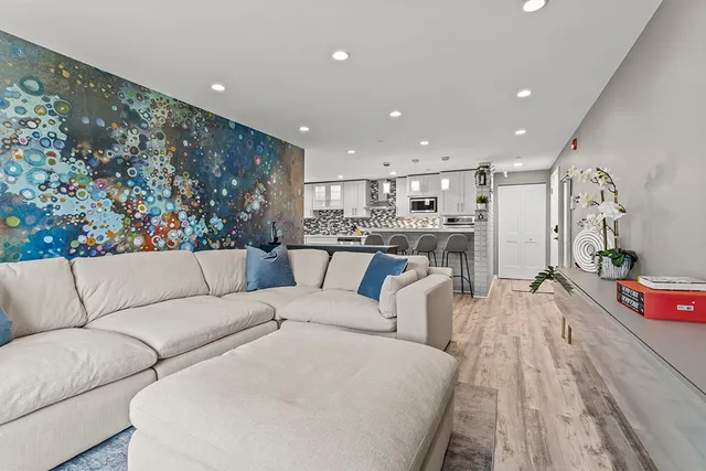 a bedroom with a bed window and television