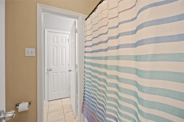 a bathroom with a sink and a shower