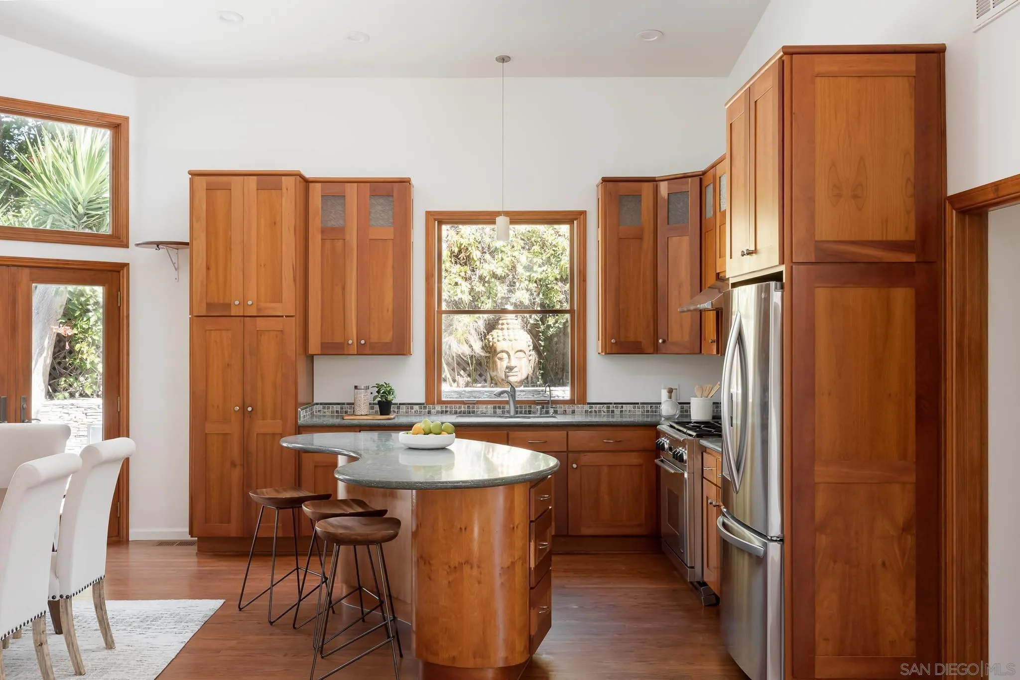 1496 Hymettus Avenue Encinitas, CA 92024 - Photo 12 of 53 a kitchen with a sink refrigerator and window