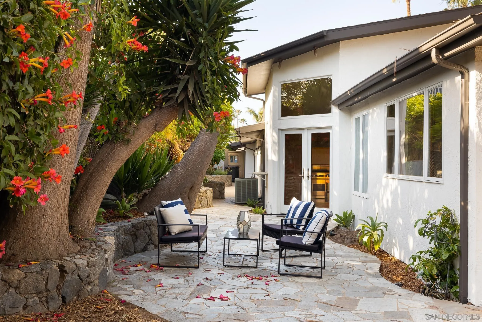 1496 Hymettus Avenue Encinitas, CA 92024 - Photo 15 of 53 a view of a patio with couple of chairs and a fountain