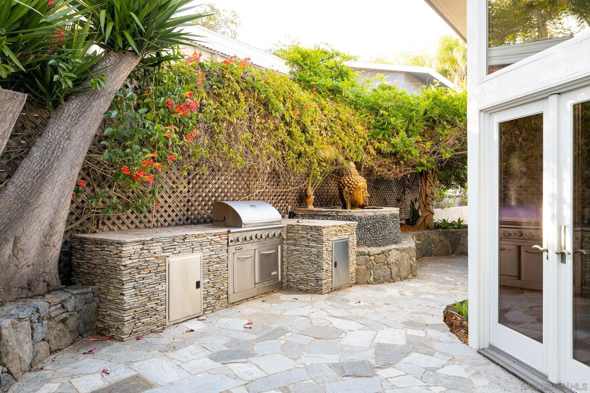 1496 Hymettus Avenue Encinitas, CA 92024 - Photo 16 of 53 a view of a chairs and table in the patio