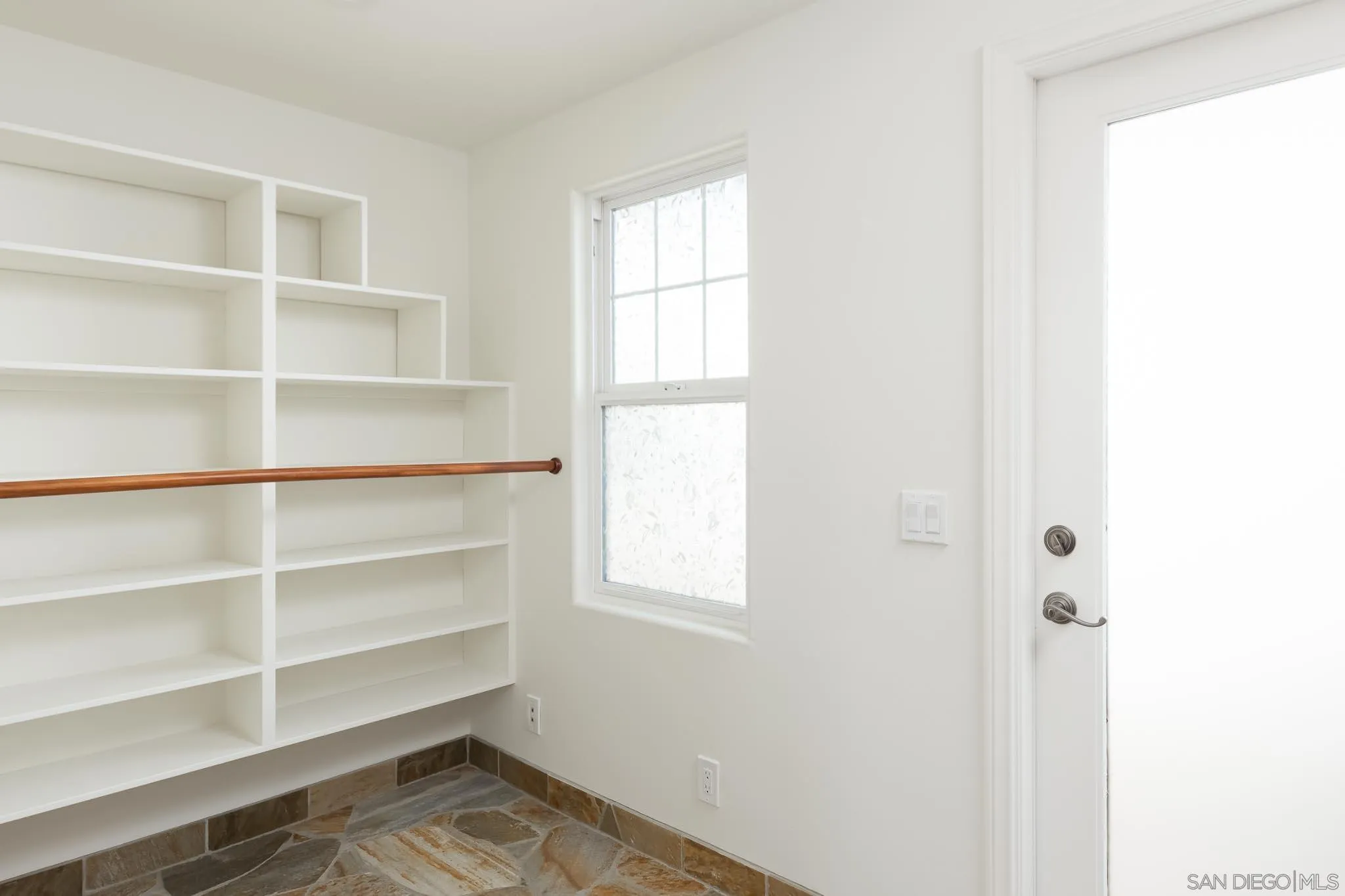 1496 Hymettus Avenue Encinitas, CA 92024 - Photo 22 of 53 an empty room with a window