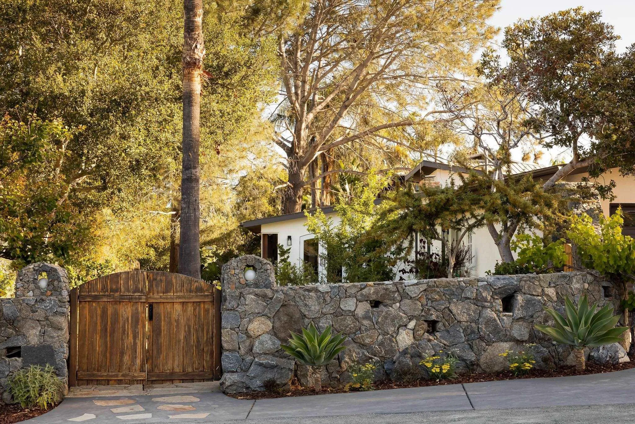 1496 Hymettus Avenue Encinitas, CA 92024 - Photo 3 of 53 a view of a yard with plants and trees