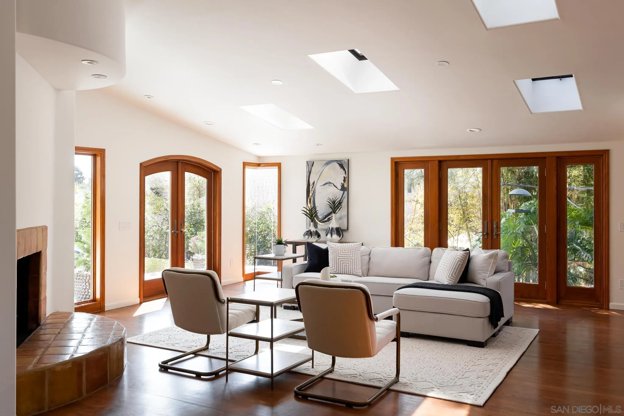 1496 Hymettus Avenue Encinitas, CA 92024 - Photo 39 of 53 a living room with furniture and a large window
