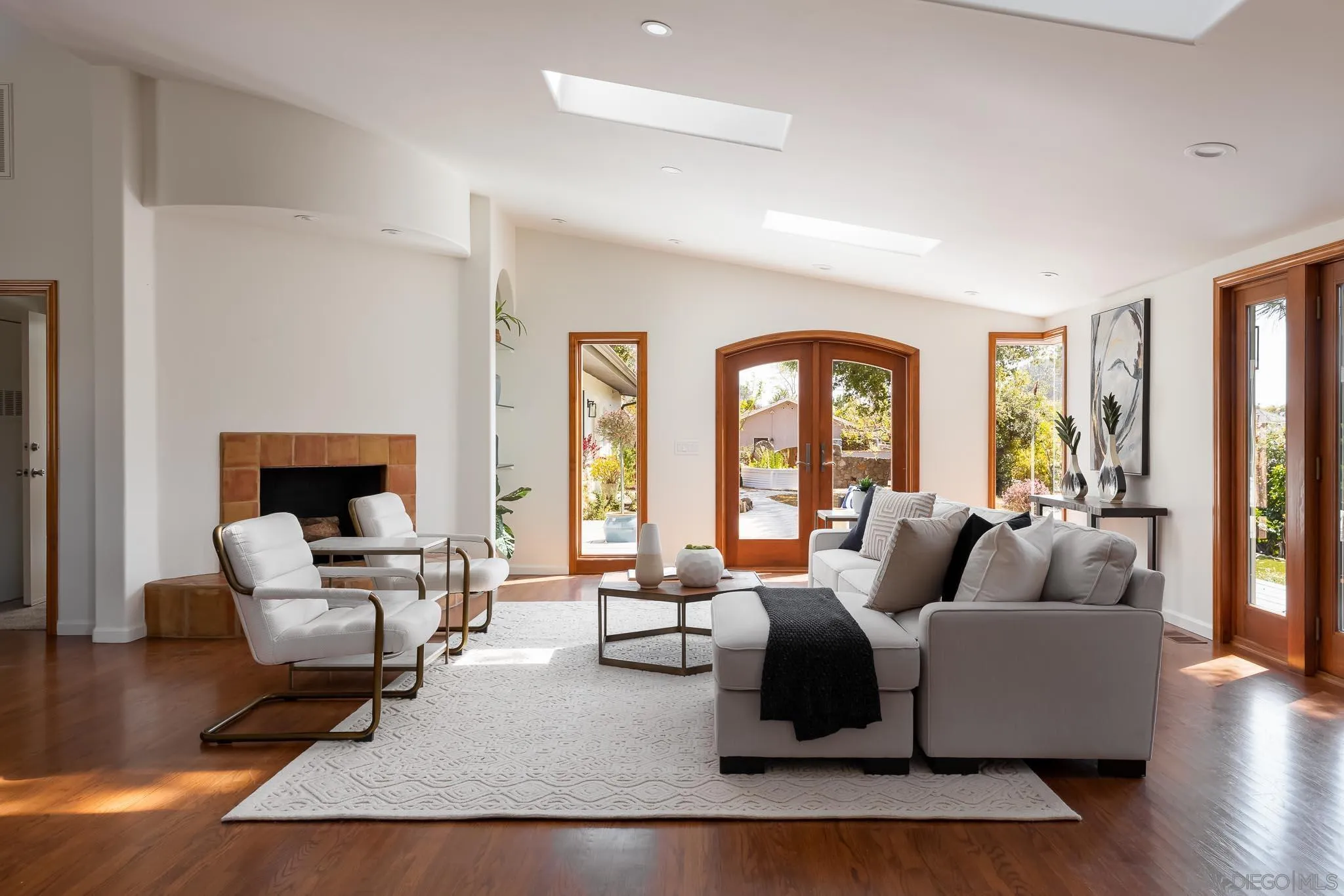 1496 Hymettus Avenue Encinitas, CA 92024 - Photo 40 of 53 a living room with furniture and a large window