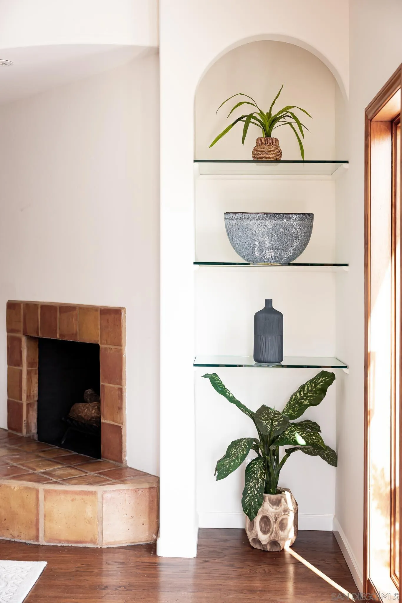 1496 Hymettus Avenue Encinitas, CA 92024 - Photo 42 of 53 a living room with furniture and a potted plant