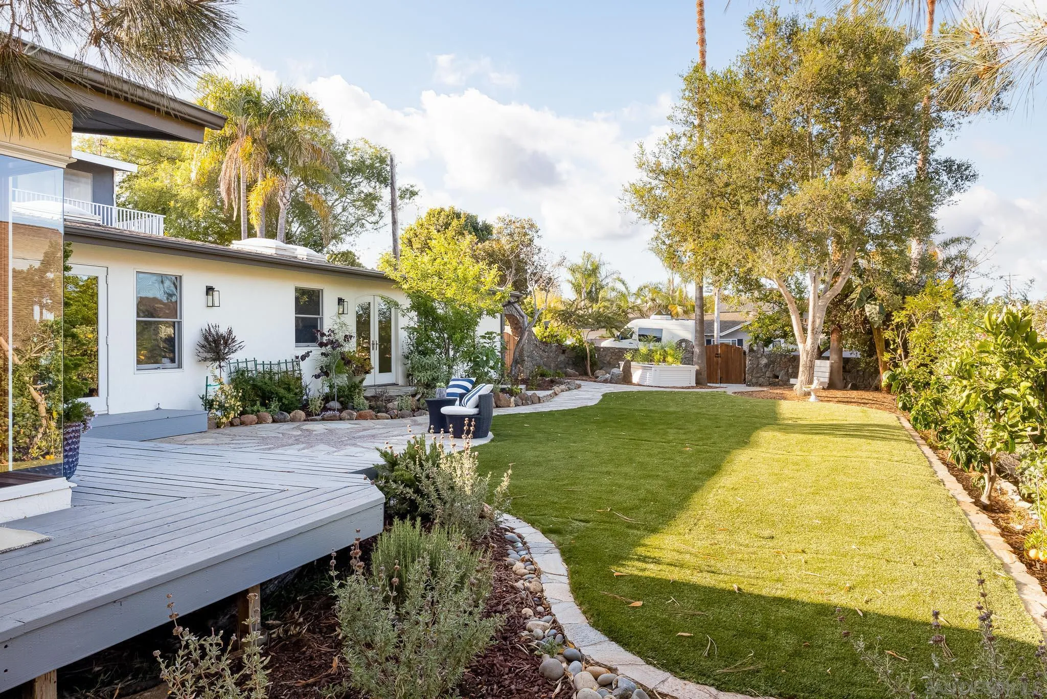 1496 Hymettus Avenue Encinitas, CA 92024 - Photo 6 of 53 a swimming pool with outdoor seating and yard