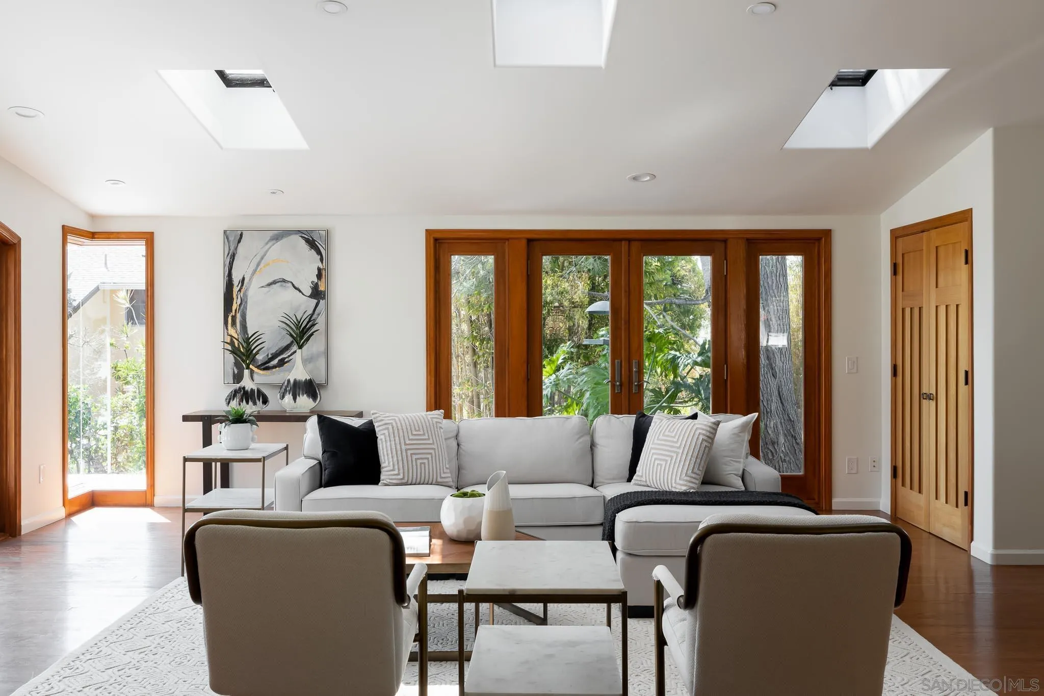 1496 Hymettus Avenue Encinitas, CA 92024 - Photo 7 of 53 a living room with furniture and a large window