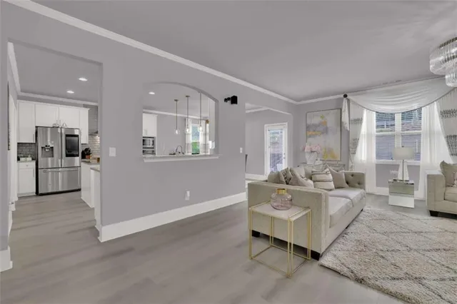 a living room with furniture and a table