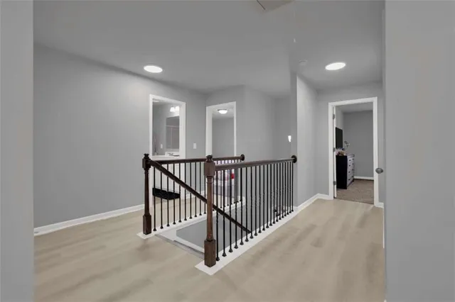 a view of a hallway with closet area