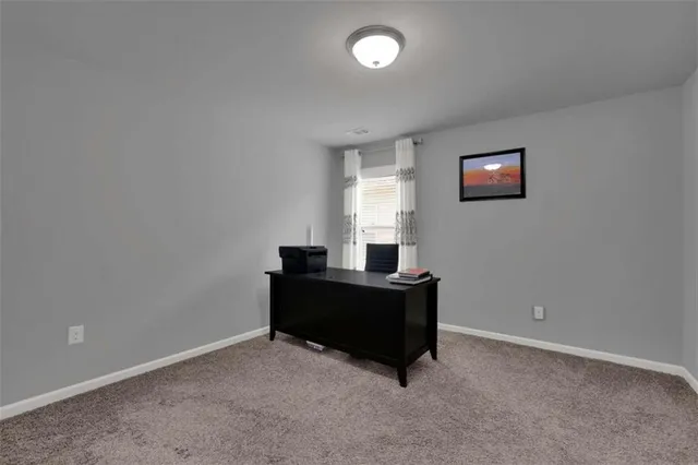 a room with furniture and window